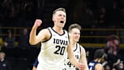 Jan 24, 2025; Iowa City, Iowa, USA; Iowa Hawkeyes forward Payton Sandfort (20) celebrates after the Hawks beat the Penn State Nittany Lions at Carver-Hawkeye Arena. Mandatory Credit: Reese Strickland-Imagn Images