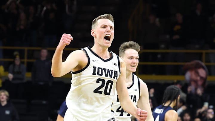 Jan 24, 2025; Iowa City, Iowa, USA; Iowa Hawkeyes forward Payton Sandfort (20) celebrates after the Hawks beat the Penn State Nittany Lions at Carver-Hawkeye Arena. Mandatory Credit: Reese Strickland-Imagn Images