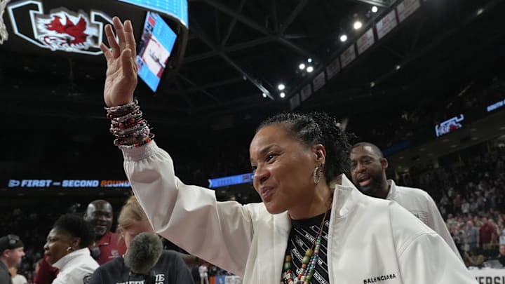 South Carolina Coach Dawn Staley waves to fans Monday, March 23, 2026, after the Gamecocks won in the NCAA Women's Basketball Tournament at Colonial Life Arena in Columbia, South Carolina.