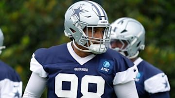 Jun 10, 2025; Arlington, TX, USA;  Dallas Cowboys defensive end Payton Turner (98) goes through a drill during practice at the Ford Center at the Star Training Facility in Frisco, Texas. Mandatory Credit: Chris Jones-Imagn Images