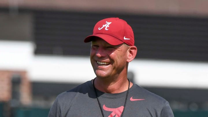 The Crimson Tide football team continued practice Thursday, Aug. 1, 2024, as they prepare for the season opener and the first game under new head coach Kalen DeBoer. DeBoer watches with a smile as his players run through defensive drills.