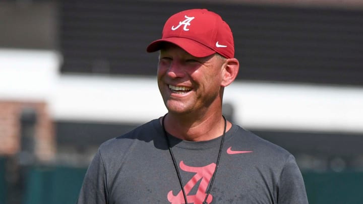 The Crimson Tide football team continued practice Thursday, Aug. 1, 2024, as they prepare for the season opener and the first game under new head coach Kalen DeBoer. DeBoer watches with a smile as his players run through defensive drills.