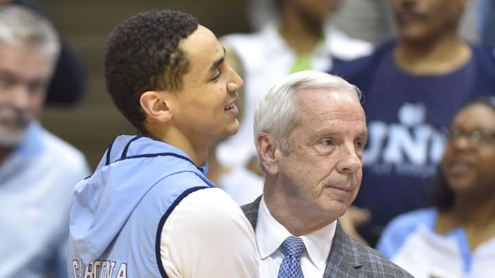 UNC basketball guard Marcus Paige and head coach Roy Williams