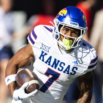 Nov 8, 2025; Tucson, Arizona, USA; Kansas Jayhawks wide receiver Cam Pickett (7) against the Arizona Wildcats in the first half at Arizona Stadium. Mandatory Credit: Mark J. Rebilas-Imagn Images