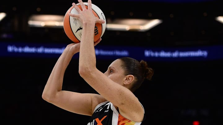 Oct 13, 2021; Phoenix, Arizona, USA; Phoenix Mercury guard Diana Taurasi (3) shoots over Chicago Sky guard Dana Evans (11) during the first half of game two of the 2021 WNBA Finals at Footprint Center. Mandatory Credit: Joe Camporeale-Imagn Images