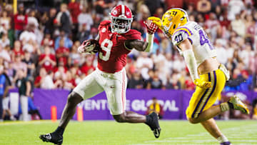 Alabama running back Richard Young runs against LSU linebacker Whit Weeks in their 2024 game.