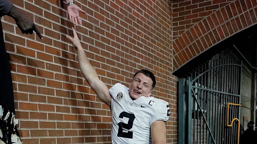 Vanderbilt quarterback Diego Pavia (2) celebrates with fans after the team’s win against Tennessee at Neyland Stadium in Knoxville, Tenn., Saturday, Nov. 29, 2025. Vanderbilt quarterback Diego Pavia (2) celebrates with fans after the team’s win against Tennessee at Neyland Stadium in Knoxville, Tenn., Saturday, Nov. 29, 2025.