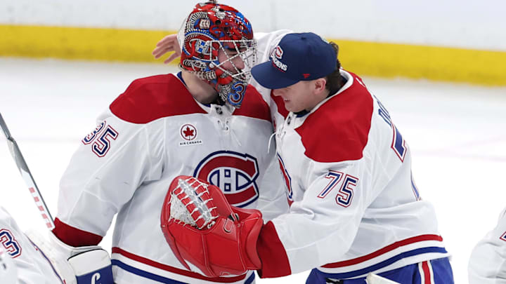 Feb 4, 2026; Winnipeg, Manitoba, CAN;Montreal Canadiens goaltender Samuel Montembeault (35) and goaltender Jakub Dobes (75) celebrate a victory against the Winnipeg Jets at Canada Life Centre. Mandatory Credit: James Carey Lauder-Imagn Images