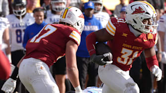 Iowa State Cyclones' defensive back (31) runs with the ball after a interception against Kansas during the fourth quarter in the senior day on Nov. 22, 2025, at Jack Trice Stadium in Ames, Iowa