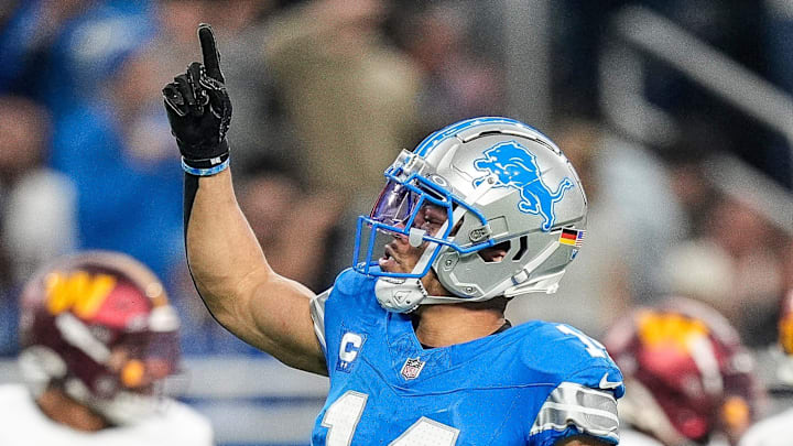 Detroit Lions wide receiver Amon-Ra St. Brown (14).