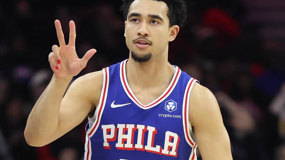 Philadelphia 76ers guard Jared McCain reacts to his three pointer against the Bucks.