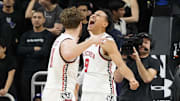 Feb 1, 2025; Evanston, Illinois, USA; Wisconsin Badgers guard John Tonje (9) and guard Max Klesmit (11) celebrate their win against the Northwestern Wildcats during the second half at Welsh-Ryan Arena. Mandatory Credit: David Banks-Imagn Images