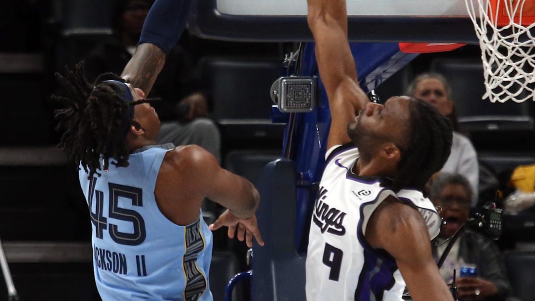 Feb 23, 2026; Memphis, Tennessee, USA; Sacramento Kings forward Precious Achiuwa (9) blocks a shot attempt by Memphis Grizzlies forward GG Jackson (45) during the first quarter at FedExForum. Mandatory Credit: Petre Thomas-Imagn Images