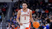 Mar 20, 2025; Providence, RI, USA; Clemson Tigers guard Chase Hunter (1) brings the ball up court against the McNeese State Cowboys during the second half at Amica Mutual Pavilion. Mandatory Credit: Gregory Fisher-Imagn Images