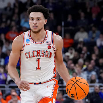 Mar 20, 2025; Providence, RI, USA; Clemson Tigers guard Chase Hunter (1) brings the ball up court against the McNeese State Cowboys during the second half at Amica Mutual Pavilion. Mandatory Credit: Gregory Fisher-Imagn Images