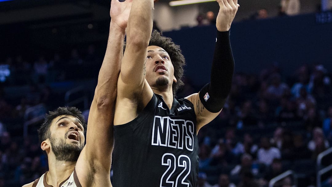 Mar 25, 2026; San Francisco, California, USA; Brooklyn Nets forward Jalen Wilson (22) shoots as Golden State Warriors center Omer Yurtseven (77) defends during the first quarter at Chase Center. Mandatory Credit: John Hefti-Imagn Images