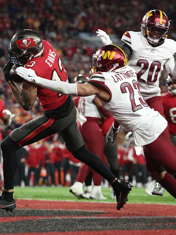 Tampa Bay Buccaneers wide receiver Mike Evans (13) and Commanders cornerback Marshon Lattimore (23) and safety Quan Martin