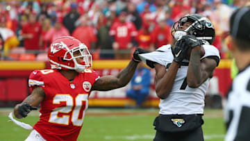 Oct 7, 2018; Kansas City, MO, USA; Jacksonville Jaguars wide receiver DJ Chark (17) catches a pass against Kansas City Chiefs cornerback Steven Nelson (20) in the first half at Arrowhead Stadium. 