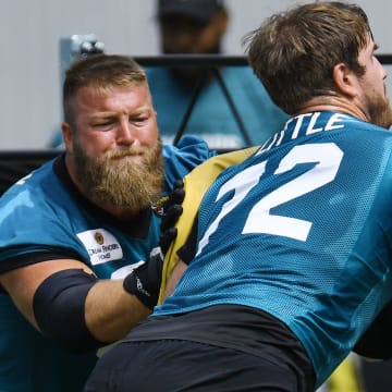 Jacksonville Jaguars center Tyler Shatley (69) and center Mitch Morse (65) face off with offensive tackle Walker Little (72) during the organized team activity session Monday, June 3, 2024 at EverBank StadiumÕs Miller Electric Center in Jacksonville, Fla. [Bob Self/Florida Times-Union]