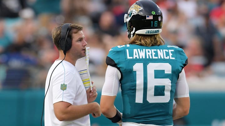 Jaguars offensive coordinator Press Taylor was on the field during the first quarter talking with Jacksonville Jaguars quarterback Trevor Lawrence (16). The Jaguars led 20 to 10 at the end of the first half. The Jacksonville Jaguars hosted the Kansas City Chiefs in the Jaguars first preseason game of the season Saturday, August10, 2024 at EverBank Stadium in Jacksonville, Fla. [Bob Self/Florida Times-Union]