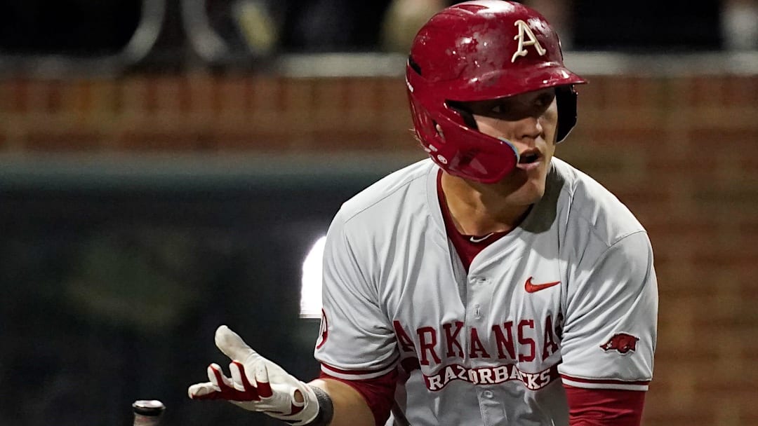 Arkansas second baseman Cam Kozeal (8) runs to first base on a 2-RBI single against Vanderbilt during the ninth inning at Hawkins Field in Nashville, Tenn., Friday, March 28, 2025.