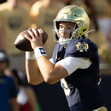 Notre Dame quarterback Riley Leonard looks for an open receiver during a NCAA college football game between Notre Dame and Northern Illinois at Notre Dame Stadium on Saturday, Sept. 7, 2024, in South Bend.