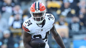 Dec 8, 2024; Pittsburgh, Pennsylvania, USA;  Cleveland Browns running back Jerome Ford (34) carries the ball against the Pittsburgh Steelers during the second quarter at Acrisure Stadium. Mandatory Credit: Charles LeClaire-Imagn Images