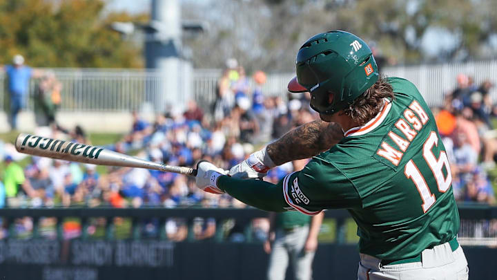 Miami's Bobby Marsh hitting the ball against Florida and bring in more RBIs on the season Miami's Bobby Marsh hitting the ball against Florida and bring in more RBIs on the season