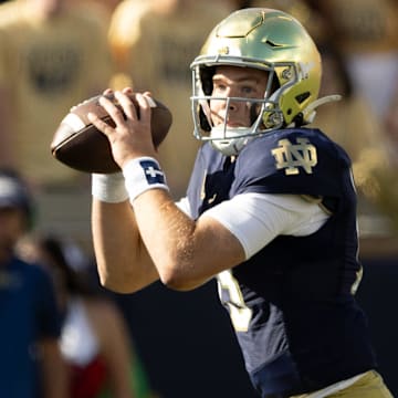 Notre Dame quarterback Riley Leonard looks for an open receiver during a NCAA college football game between Notre Dame and Northern Illinois at Notre Dame Stadium on Saturday, Sept. 7, 2024, in South Bend.