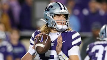 Oct 26, 2024; Manhattan, Kansas, USA; Kansas State Wildcats quarterback Avery Johnson (2) drops back to pass during the third quarter against the Kansas Jayhawks at Bill Snyder Family Football Stadium. Mandatory Credit: Scott Sewell-Imagn Images