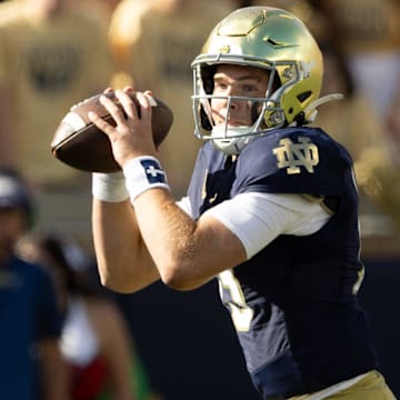 Notre Dame quarterback Riley Leonard looks for an open receiver during a NCAA college football game between Notre Dame and Northern Illinois at Notre Dame Stadium on Saturday, Sept. 7, 2024, in South Bend.