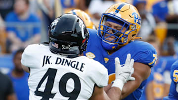 Sep 9, 2023; Pittsburgh, Pennsylvania, USA;  Pittsburgh Panthers offensive lineman Branson Taylor (78) blocks against Cincinnati Bearcats linebacker Jack Dingle (49) during the first quarter at Acrisure Stadium. Mandatory Credit: Charles LeClaire-Imagn Images