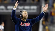 Nov 28, 2025; Tempe, Arizona, USA; Arizona Wildcats head coach Brent Brennan celebrates against the Arizona State Sun Devils in the second half during the 99th Territorial Cup at Mountain America Stadium. Mandatory Credit: Mark J. Rebilas-Imagn Images