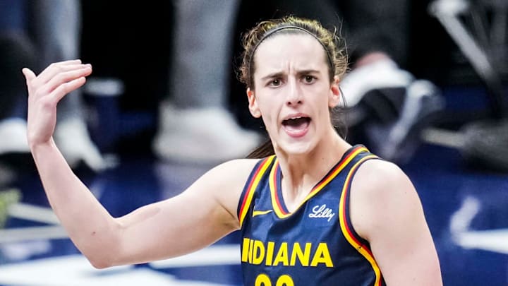 Indiana Fever guard Caitlin Clark celebrates during a game between the Indiana Fever and the Connecticut Sun.