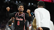 Mylik Wilson (8) celebrates after Houston's 70-67 win against Duke in the Final Four on April 5, 2025.