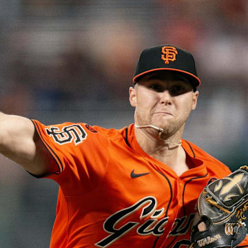 Sep 27, 2024; San Francisco, California, USA; San Francisco Giants starting pitcher Landen Roupp (65) delivers a pitch against the St. Louis Cardinals during the first inning at Oracle Park.