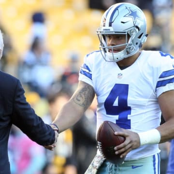 Nov 13, 2016; Pittsburgh, PA, USA;  Dallas Cowboys owner Jerry Jones and quarterback Dak Prescott (4) greet each other before their game against the Pittsburgh Steelers at Heinz Field.