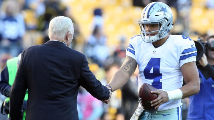 Nov 13, 2016; Pittsburgh, PA, USA;  Dallas Cowboys owner Jerry Jones and quarterback Dak Prescott (4) greet each other before their game against the Pittsburgh Steelers at Heinz Field.