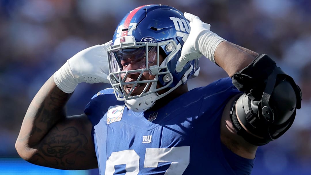 Sep 28, 2025; East Rutherford, New Jersey, USA; New York Giants defensive tackle Dexter Lawrence (97) reacts during the fourth quarter against the Los Angeles Chargers at MetLife Stadium. Mandatory Credit: Brad Penner-Imagn Images
