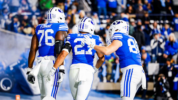 BYU left tackle Caleb Etienne and running back LJ Martin against Oklahoma State