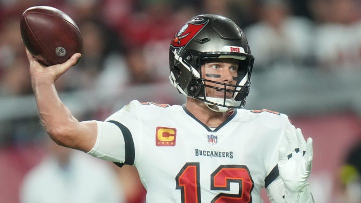 Tampa Bay Buccaneers quarterback Tom Brady (12) throws the ball against the Arizona Cardinals at State Farm Stadium in Glendale on Dec. 25, 2022.