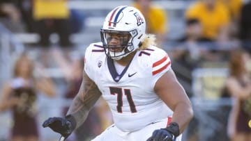 Nov 25, 2023; Tempe, Arizona, USA; Arizona Wildcats offensive lineman Jonah Savaiinaea (71) against the Arizona State Sun Devils during the Territorial Cup at Mountain America Stadium.