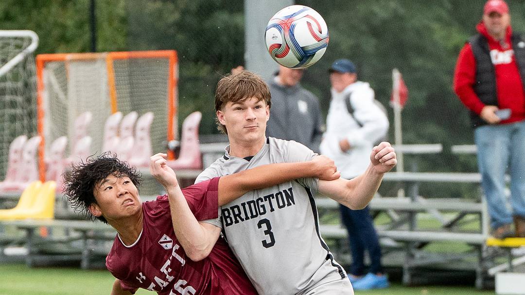 Taft School's Keigo Takanabe (16) and Bridgton Academy's Jaxson Wollenberg (3) fight for possession in the teams' NXT LVL Invitational clash on Sunday.