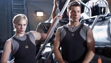 BATTLESTAR GALACTICA -- SCI FI Channel -- Pictured: (l-r) Katee Sackhoff as Kara "Starbuck" Thrace, Grace Park as Sharon "Boomer" Valerii, Jamie Bamber as Lee "Apollo" Adama 
