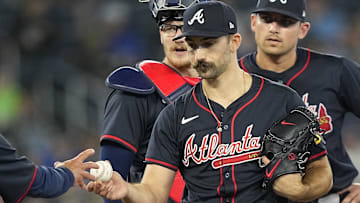 Apr 16, 2025; Toronto, Ontario, CAN; Atlanta Braves manager Brian Snitker (43) takes Atlanta Braves pitcher Spencer Strider (99) out of the game during the sixth inning against the Toronto Blue Jays at Rogers Centre. Mandatory Credit: John E. Sokolowski-Imagn Images