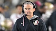 Nov 9, 2024; South Bend, Indiana, USA; Florida State Seminoles head coach Mike Norvell watches in the third quarter against the Notre Dame Fighting Irish at Notre Dame Stadium. Mandatory Credit: Matt Cashore-Imagn Images