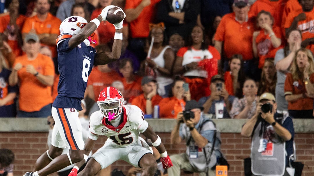 Auburn Tigers wide receiver Cam Coleman (8) catches a pass as Auburn Tigers take on Georgia Bulldogs at Jordan-Hare Stadium in Auburn, Ala. on Saturday, Oct. 11, 2025. Georgia Bulldogs defeated Auburn Tigers 20-10. Auburn Tigers wide receiver Cam Coleman (8) catches a pass as Auburn Tigers take on Georgia Bulldogs at Jordan-Hare Stadium in Auburn, Ala. on Saturday, Oct. 11, 2025. Georgia Bulldogs defeated Auburn Tigers 20-10.