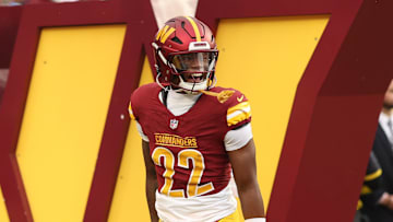 Nov 9, 2025; Landover, Maryland, USA; Washington Commanders running back Jacory Croskey-Merritt (22) runs onto the field prior to the Commanders' game against the Detroit Lions at Northwest Stadium. Mandatory Credit: Geoff Burke-Imagn Images