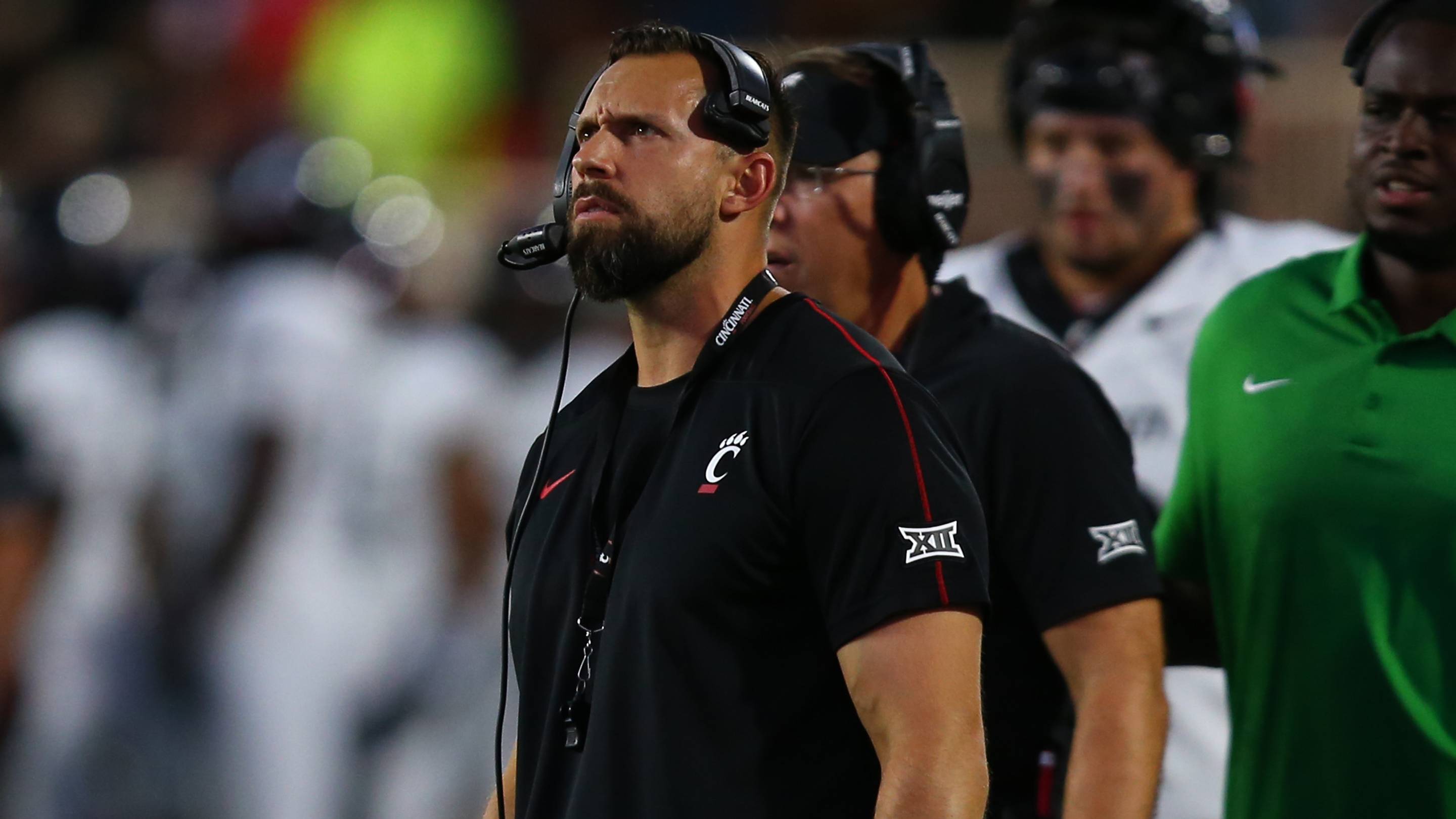 Sep 28, 2024; Lubbock, Texas, USA; Cincinnati Bearcats assistant coach Nic Cardwell in the first half during the game against the Texas Tech Red Raiders at Jones AT&T Stadium and Cody Campbell Field. Mandatory Credit: Michael C. Johnson-Imagn Images | USA TODAY Sports via Reuters Connect