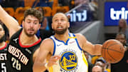 Apr 26, 2025; San Francisco, California, USA; Golden State Warriors guard Stephen Curry (30) dribbles against Houston Rockets center Alperen Sengun (28) during the second quarter of game three of first round for the 2024 NBA Playoffs at Chase Center. Mandatory Credit: Darren Yamashita-Imagn Images